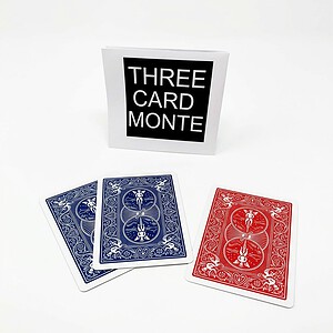3 Card Monte magic trick - the three cards face down showing two blue backs and the single red back to follow