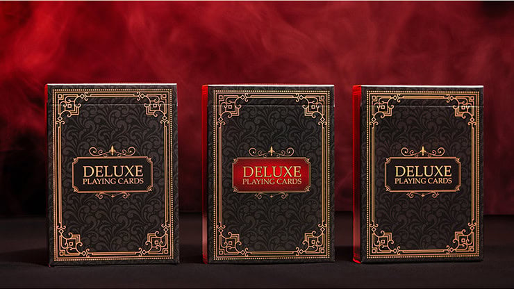 Deluxe playing cards set with ornate black and gold packaging for magic tricks and cardistry.