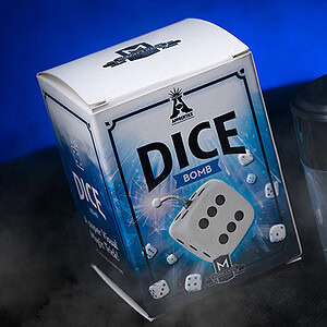 DICE BOMB magic trick kit with box and transparent container on a dark background.