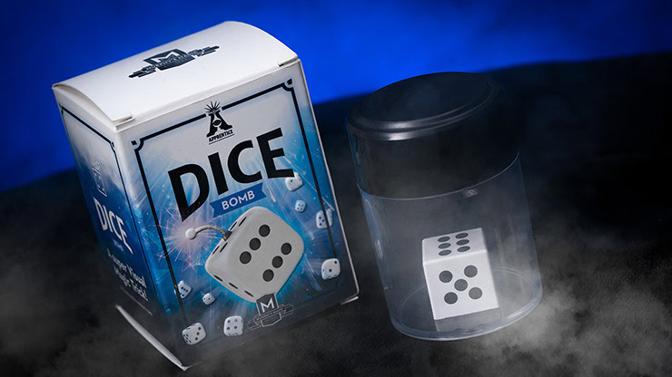 DICE BOMB magic trick kit with box and transparent container on a dark background.