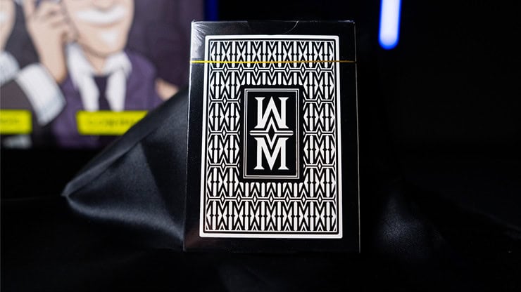 A colorful playing card deck with a bold "WM" logo, set against a dark background.