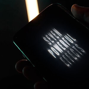 Seven Powerful Effects illuminated on a smartphone screen in a dark environment.