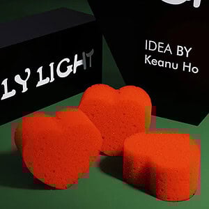 Holy Light by Iarvel Magic - Heart-shaped red magic candies with mystical packaging.
