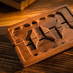 Wooden magic trick box with hidden compartments for illusions.
