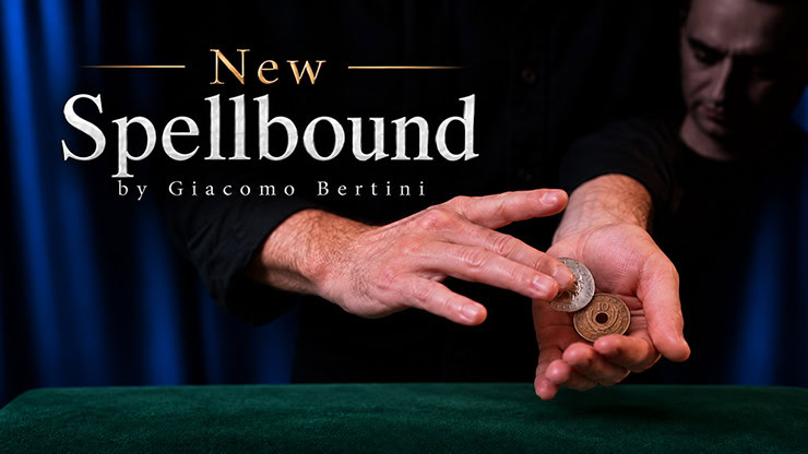 Close-up of a magician's hands performing a coin trick with coins on a green table.