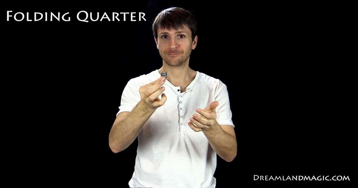 folding coin trick bite out magic quarter view demo folding quarter