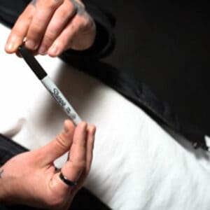 Visual Pen Trick Holding Sharpie