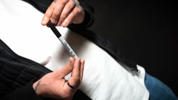 Visual Pen Trick Holding Sharpie