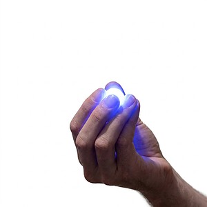 Appearing Magical Lights — hand pinching a glowing blue light, white background